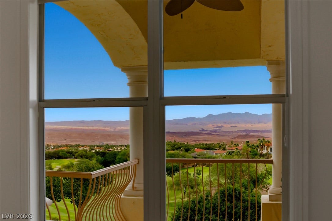 26 Strada Di Circolo, #n/a, Henderson, NV 89011 Framed windows look out to a sweeping mountain range and lush valley scenery.