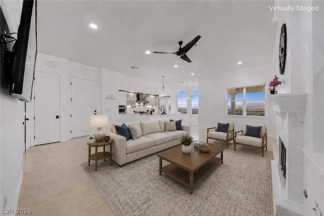 26 Strada Di Circolo, #n/a, Henderson, NV 89011 An open floorplan seamlessly connects the bright living area with the modern kitchen space.