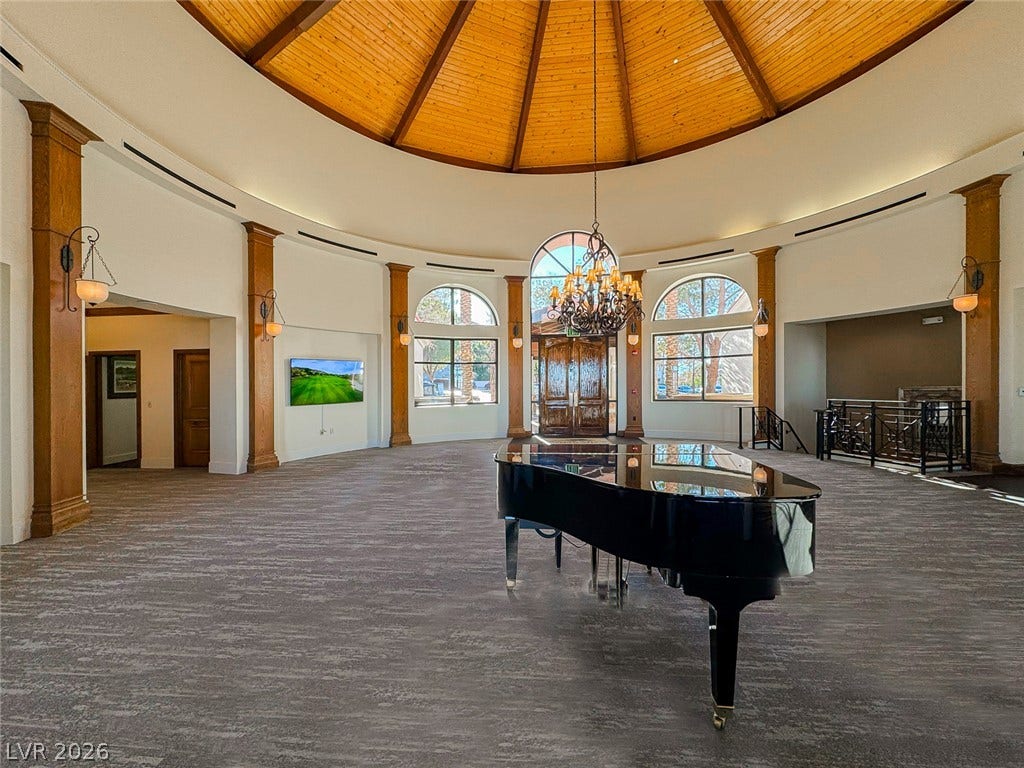 26 Strada Di Circolo, #n/a, Henderson, NV 89011 A magnificent wood-paneled rotunda ceiling rises above the expansive, carpeted reception hall.