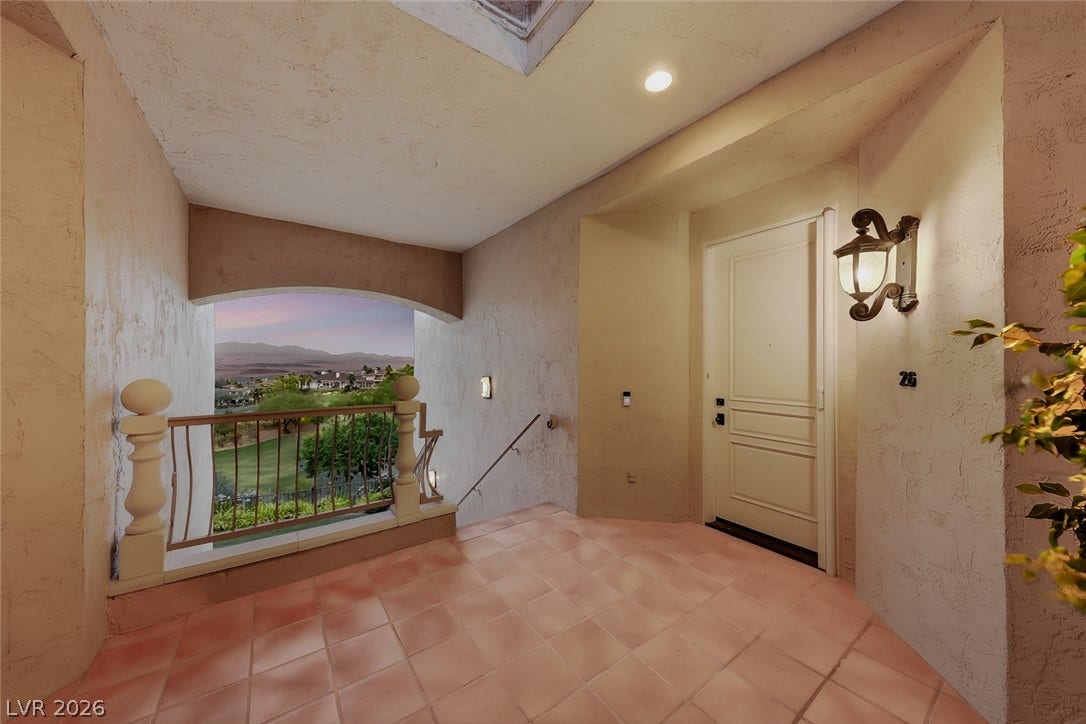 26 Strada Di Circolo, #n/a, Henderson, NV 89011 An inviting tiled entry porch looks out over rolling hills and neighborhood views.