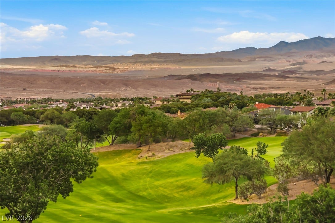 26 Strada Di Circolo, #n/a, Henderson, NV 89011 Rolling fairways give way to rugged desert ridges under expansive blue skies.