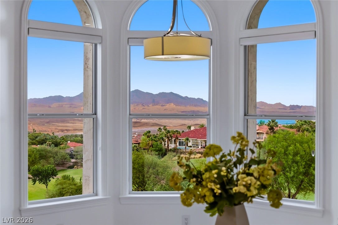 26 Strada Di Circolo, #n/a, Henderson, NV 89011 Dramatic mountain vistas unfold through elegant arched windows.