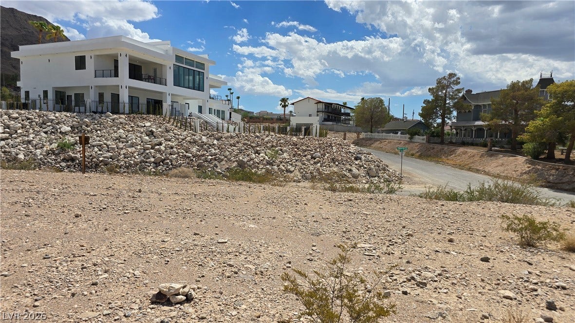 740 Benedict Drive, Las Vegas, NV 89110 Beautiful neighboring homes under a wide open sky.