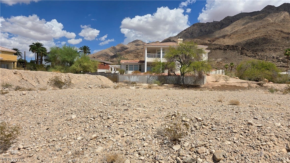 740 Benedict Drive, Las Vegas, NV 89110 Inviting terrain frames this property with dramatic mountain backdrops rising in the distance.