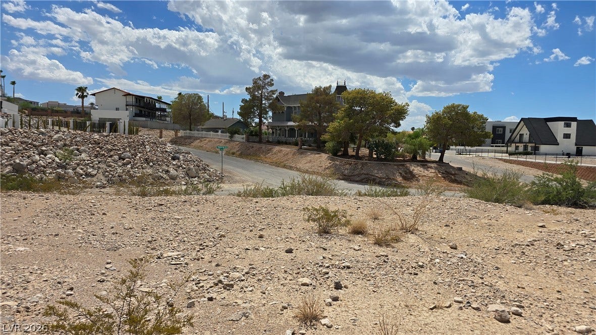 740 Benedict Drive, Las Vegas, NV 89110 A spacious vacant lot stands ready for custom development in an established desert