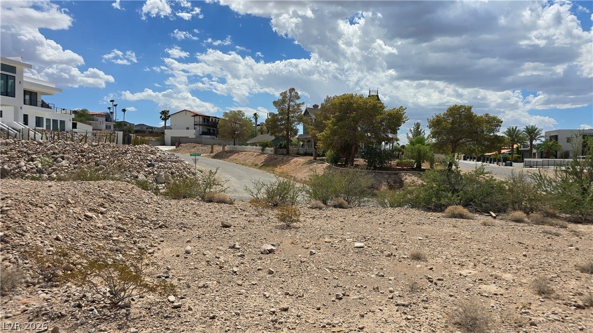 740 Benedict Drive, Las Vegas, NV 89110 A spacious desert building lot awaits custom construction in an established neighborhood.