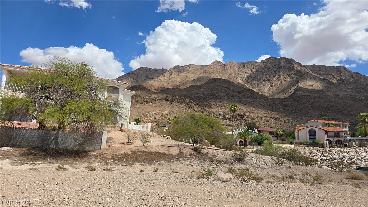 740 Benedict Drive, Las Vegas, NV 89110 Dramatic mountain peaks rise sharply behind the surrounding residential properties.