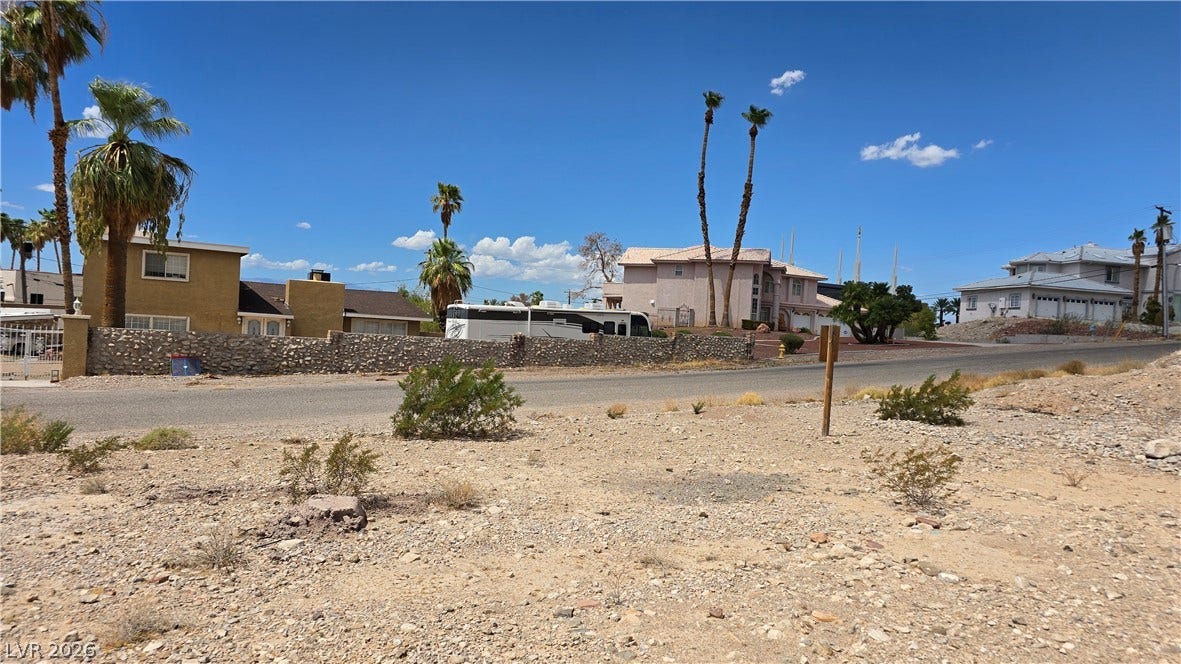 740 Benedict Drive, Las Vegas, NV 89110 An open desert parcel offers immense potential within an established residential neighborhood.