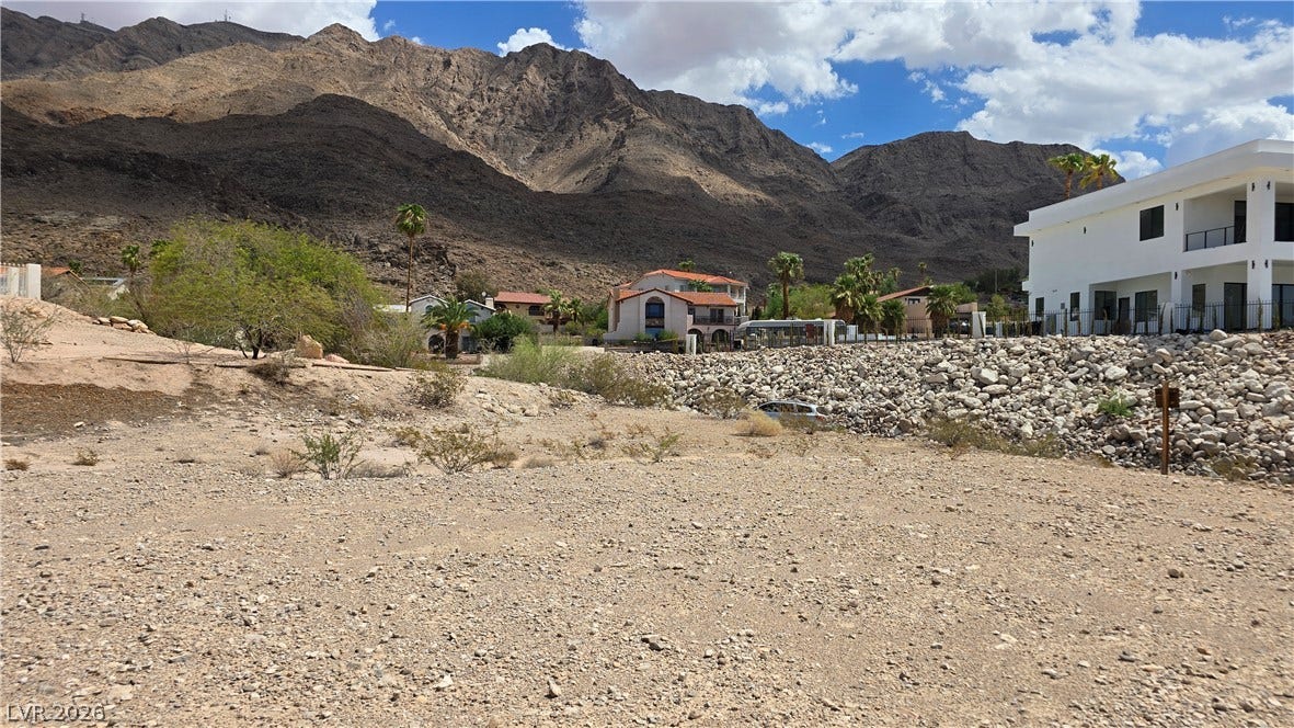 740 Benedict Drive, Las Vegas, NV 89110 Dramatic mountain vistas frame this spacious lot nestled within a desert landscape.