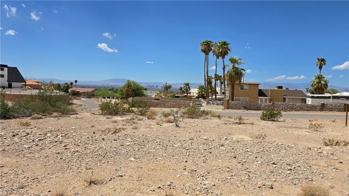 740 Benedict Drive, Las Vegas, NV 89110 A spacious vacant lot stands ready for custom development in an established desert