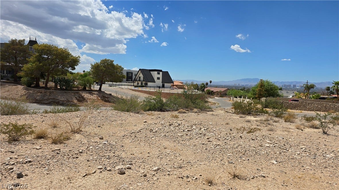740 Benedict Drive, Las Vegas, NV 89110 A spacious vacant lot stands ready for custom development in an established desert