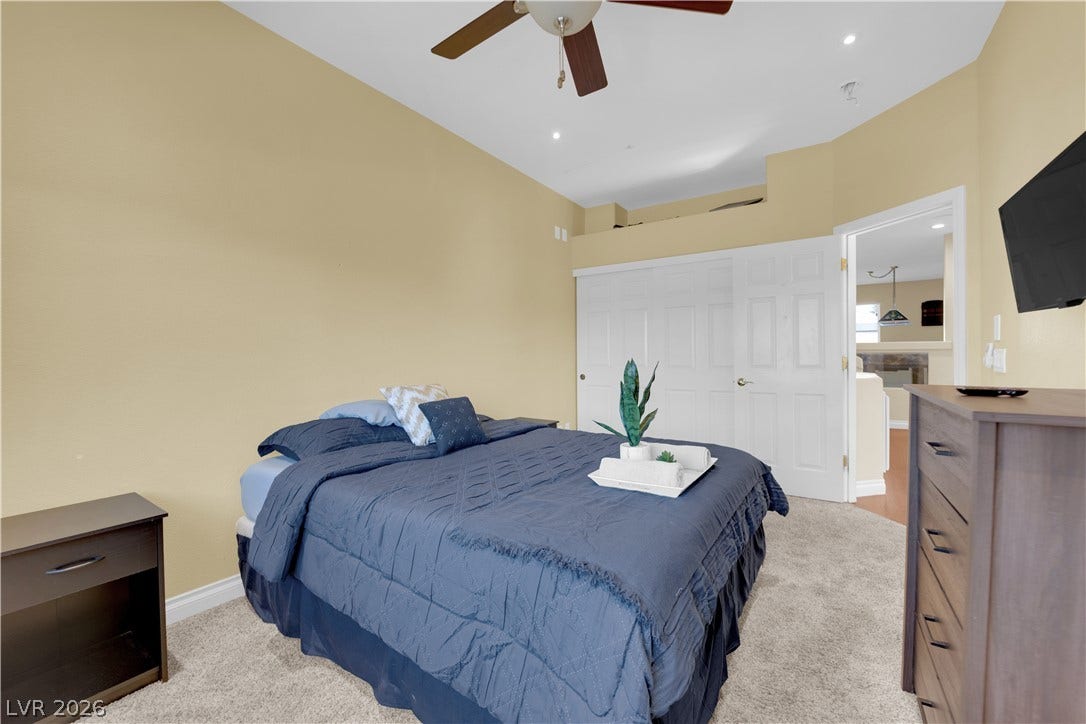 9852 Snowy Canyon Court, Las Vegas, NV 89183 High ceilings and soft carpeting create a comfortable atmosphere in this restful bedroom.