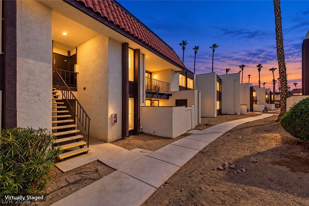 1405 Vegas Valley Drive, #187, Las Vegas, NV 89169 Spanish tile accents and a concrete pathway complement this multi-level exterior architecture.