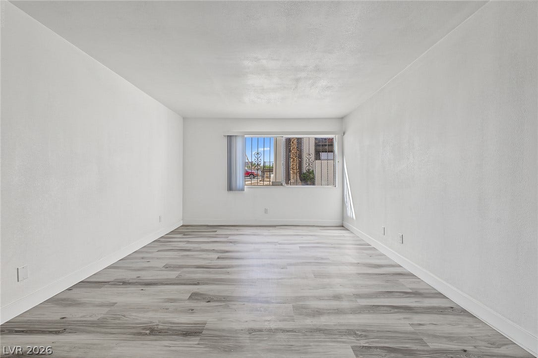 1405 Vegas Valley Drive, #187, Las Vegas, NV 89169 Clean lines and durable laminate flooring define this versatile, light-filled living space.