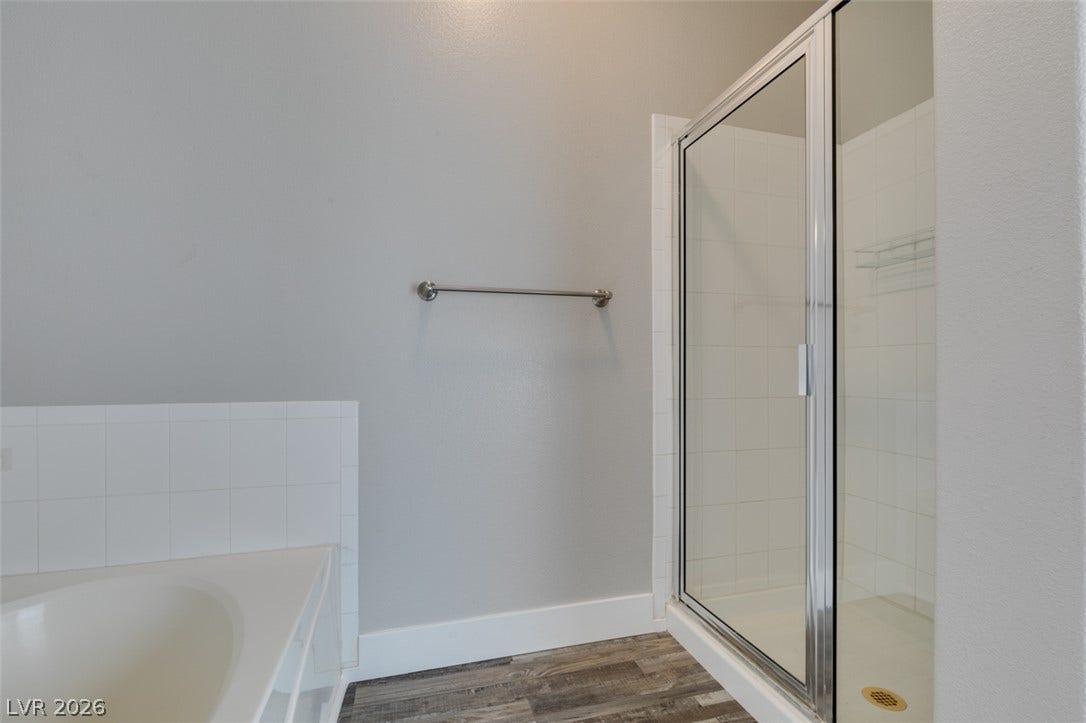 2001 Jade Creek Street, #105, Las Vegas, NV 89117 Clean lines and a walk-in shower define this functional washroom.