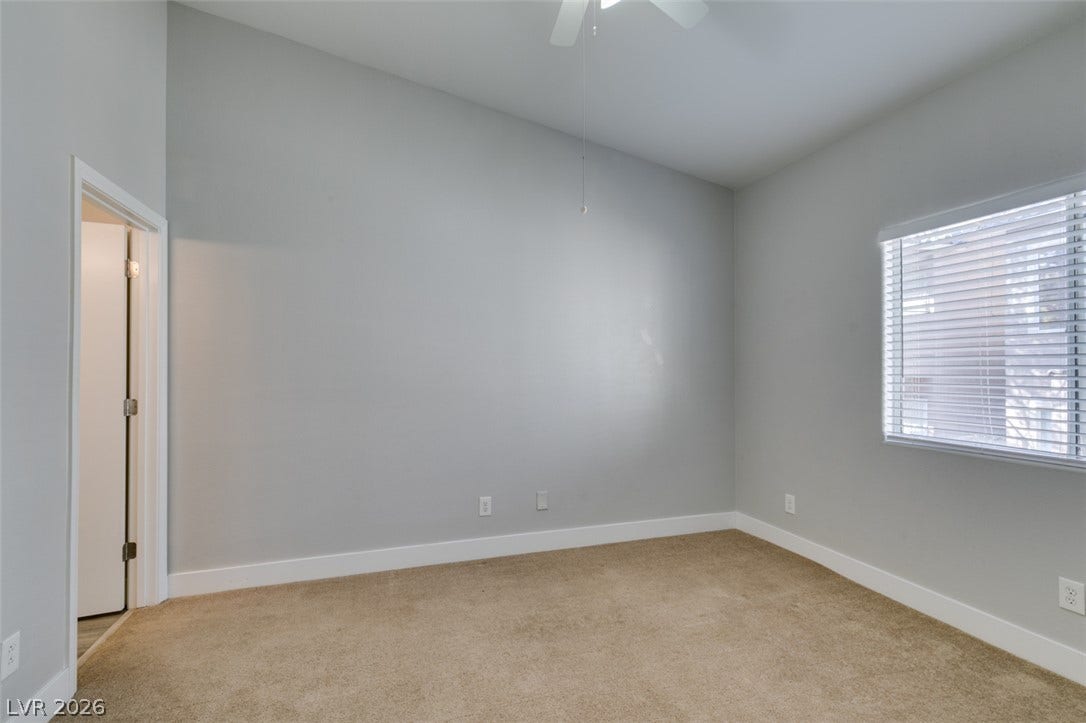 2001 Jade Creek Street, #105, Las Vegas, NV 89117 High ceilings and neutral carpet define this versatile space.