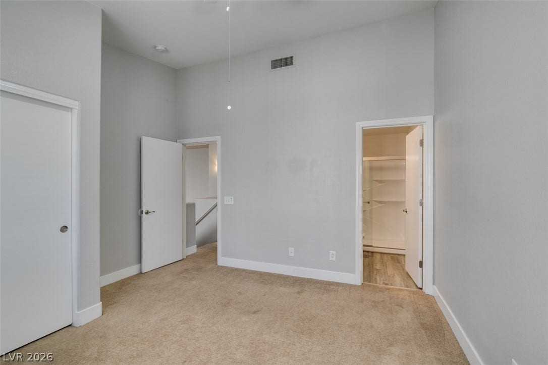 2001 Jade Creek Street, #105, Las Vegas, NV 89117 High ceilings and neutral carpet define this versatile upper-level space.
