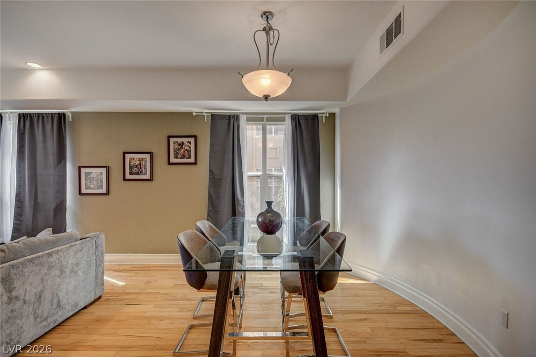 Clean architectural lines define this welcoming open dining space.