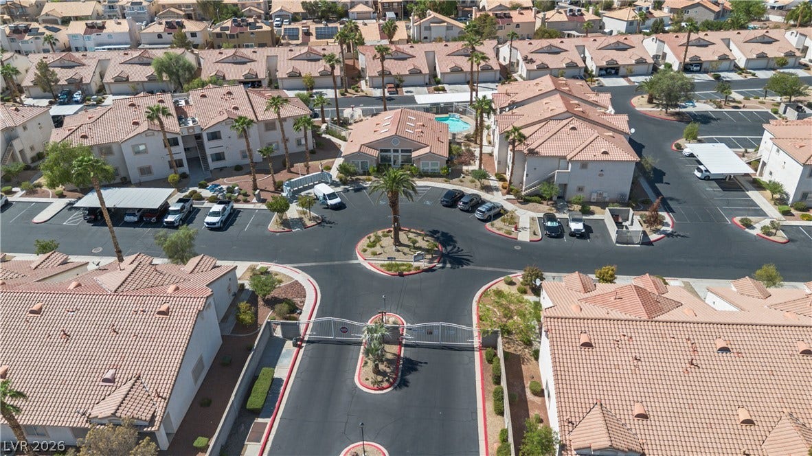 855 N Stephanie Street, #2615, Henderson, NV 89014 Gated entry point grants access to a beautifully planned residential neighborhood with tile-roofed homes.