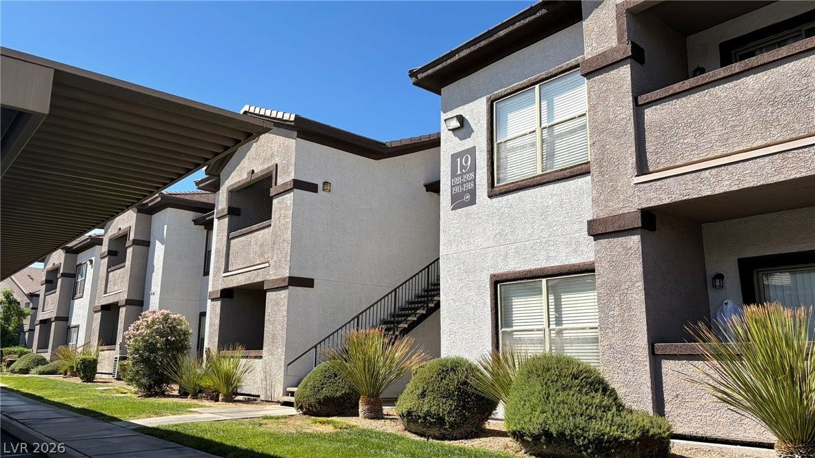 45 Maleena Mesa Street, #1912, Henderson, NV 89074 Stucco exteriors and covered parking structures define this modern residential complex.