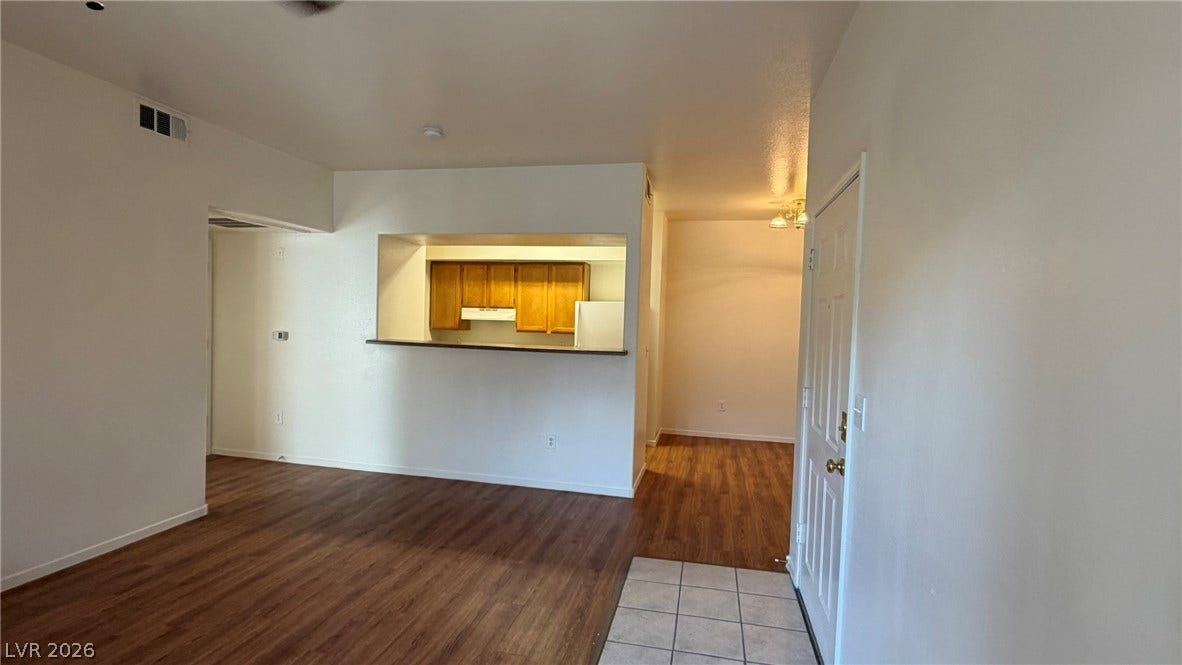 45 Maleena Mesa Street, #1912, Henderson, NV 89074 Warm wood flooring meets tiled entryways in this open, versatile floor plan.