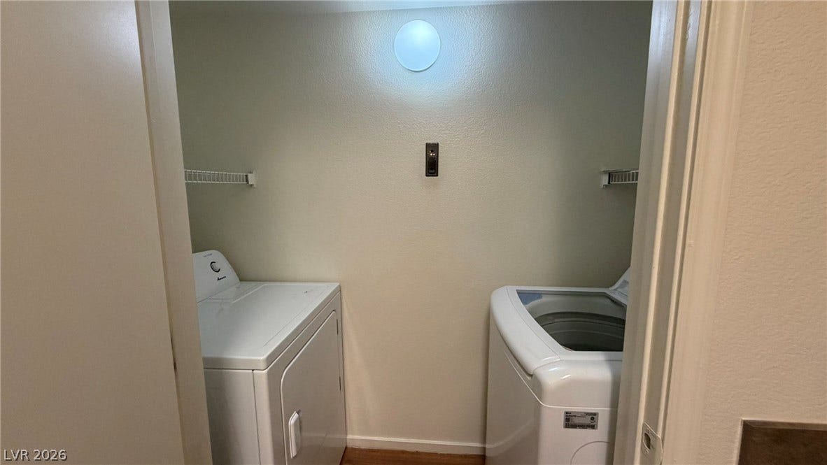 45 Maleena Mesa Street, #1912, Henderson, NV 89074 A dedicated laundry closet features a matching washer and dryer setup with overhead wire shelving.