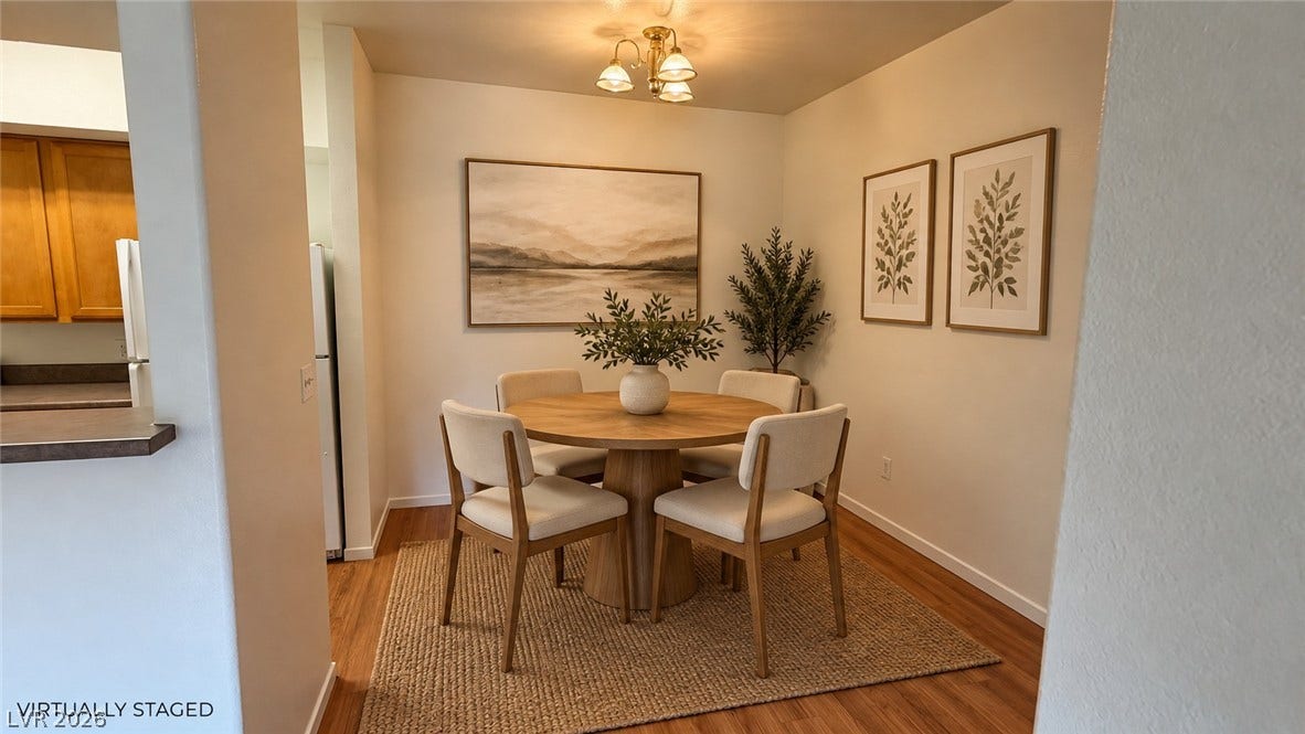 45 Maleena Mesa Street, #1912, Henderson, NV 89074 Warm wood flooring anchors this inviting dining area adjacent to the kitchen.