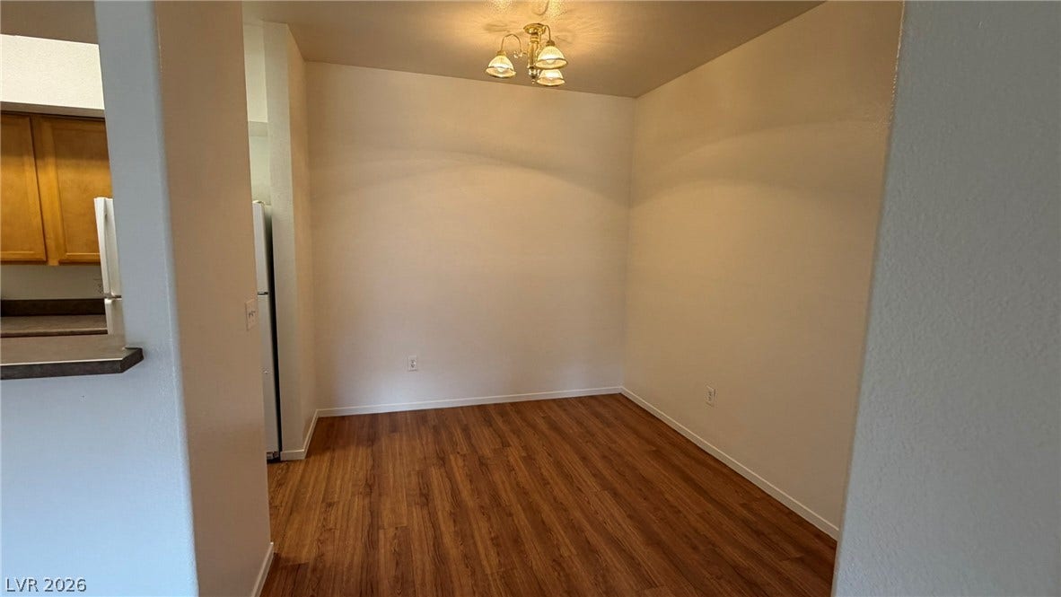 45 Maleena Mesa Street, #1912, Henderson, NV 89074 Rich wood flooring anchors this dedicated dining space adjoining the kitchen.