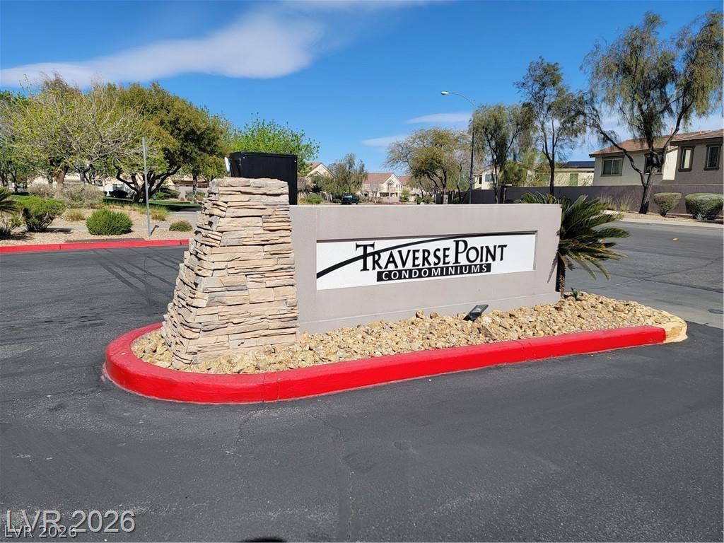 45 Maleena Mesa Street, #1912, Henderson, NV 89074 A stone monument sign marks the entrance to this private condominium community.