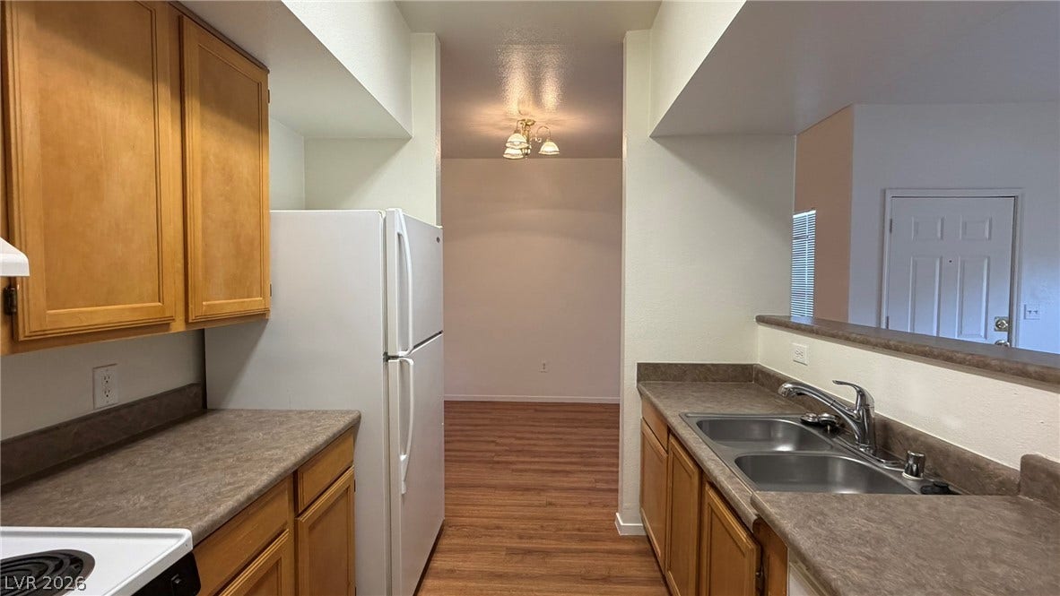 45 Maleena Mesa Street, #1912, Henderson, NV 89074 Functional kitchen design opens directly to adjacent living and dining spaces.