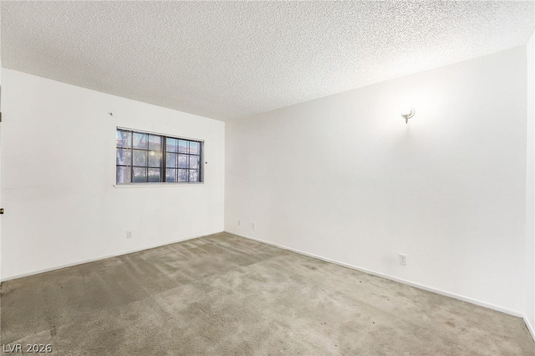 4340 Sanderling Circle, #78, Las Vegas, NV 89103 Plush carpeting and textured ceilings define this clean, versatile interior living area.