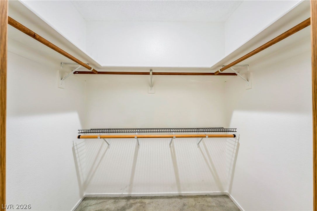 4340 Sanderling Circle, #78, Las Vegas, NV 89103 Ample storage options define this practical walk-in closet space with sturdy built-in shelving.