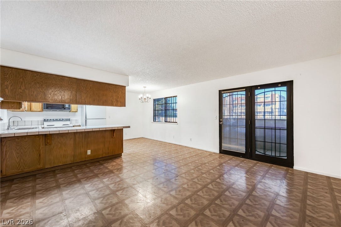 4340 Sanderling Circle, #78, Las Vegas, NV 89103 An open floorplan seamlessly connects the central living area to the adjacent kitchen.