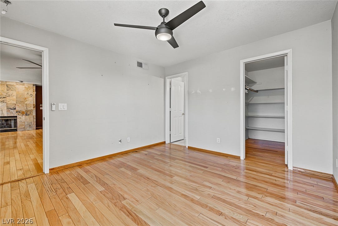 701 Capri Drive, #10B, Boulder City, NV 89005 Gleaming hardwood floors run throughout this versatile space featuring a built-in closet system.