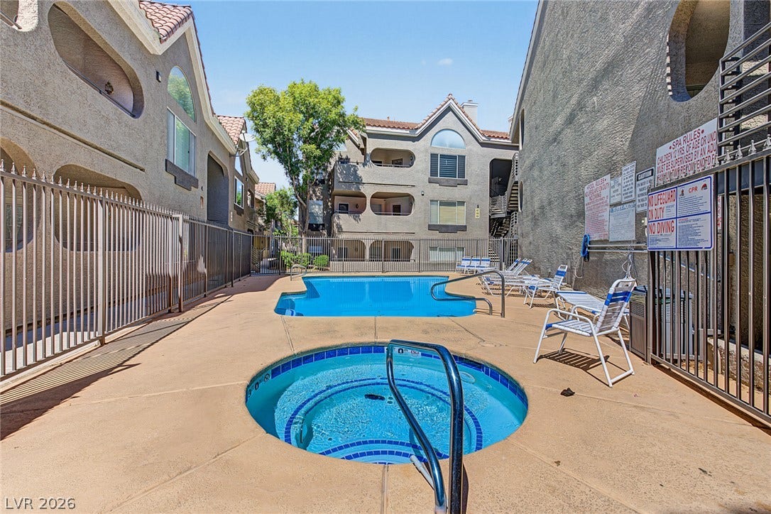 701 Capri Drive, #10B, Boulder City, NV 89005 A sparkling community pool and spa invite relaxation within this secured residential courtyard.