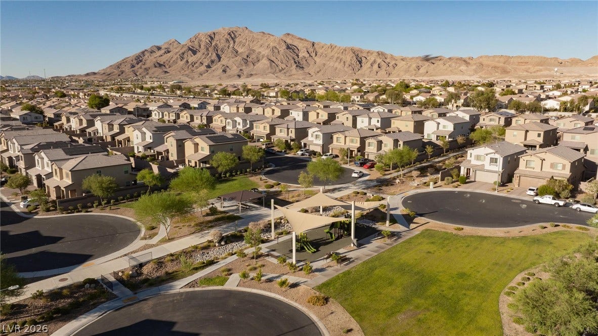 2728 Lindsey Springs Street, Las Vegas, NV 89142 Panoramic neighborhood views unfold against a dramatic mountain backdrop.
