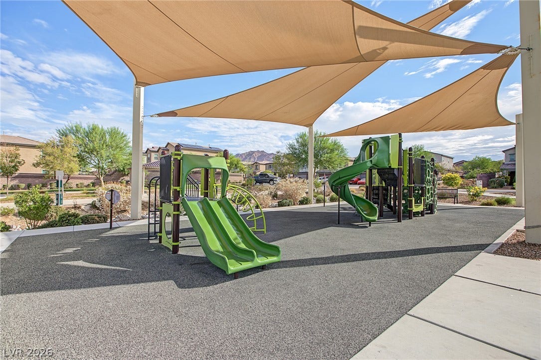 2728 Lindsey Springs Street, Las Vegas, NV 89142 Shade sails cover the modern play area on a beautifully paved recreation surface.