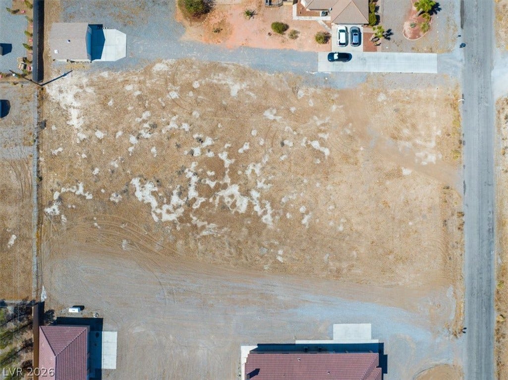 1641 W Huckleberry Street, Pahrump, NV 89048 An aerial perspective showcases a level building lot situated within an established residential neighborhood.