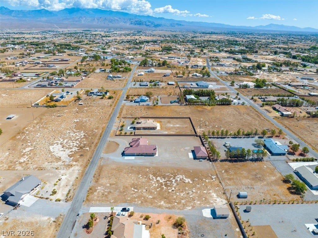 1641 W Huckleberry Street, Pahrump, NV 89048 Sweeping mountain vistas frame this desert neighborhood from an elevated perspective.