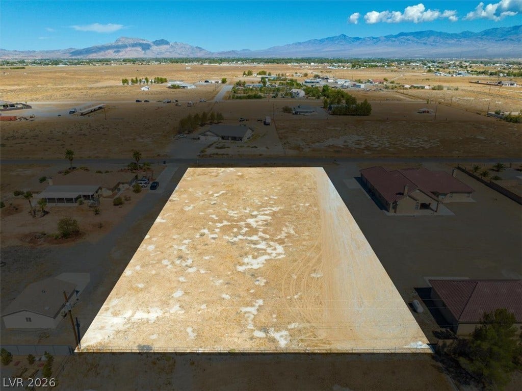 1641 W Huckleberry Street, Pahrump, NV 89048 Sweeping mountain and desert views frame this level building lot in a quiet neighborhood.