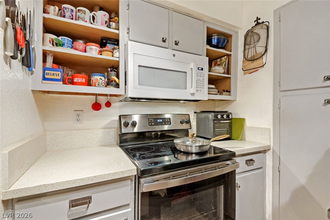 8101 W Flamingo Road, #1074, Las Vegas, NV 89147 Abundant cabinet space surrounds the integrated range and built-in microwave.
