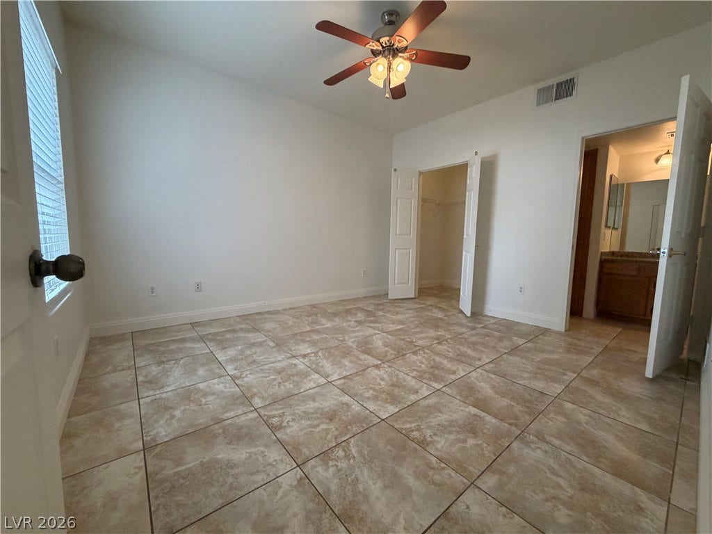 7255 W Sunset Road, #1167, Las Vegas, NV 89113 Tiled flooring and neutral walls define this versatile space with walk-in closet access.