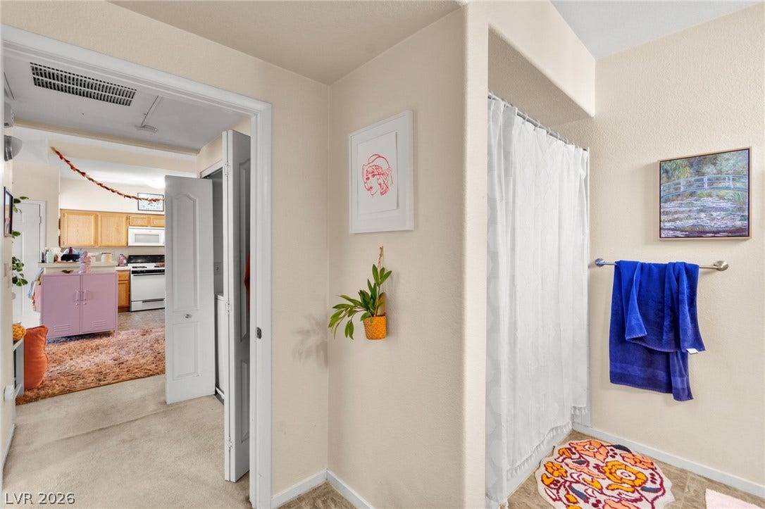 7628 Pacific Hills Avenue, #204, Las Vegas, NV 89128 Functional layout connects the main wash area seamlessly to surrounding rooms.