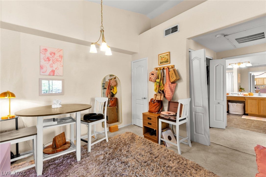7628 Pacific Hills Avenue, #204, Las Vegas, NV 89128 High ceilings and neutral tones create an inviting, open atmosphere in this versatile space.