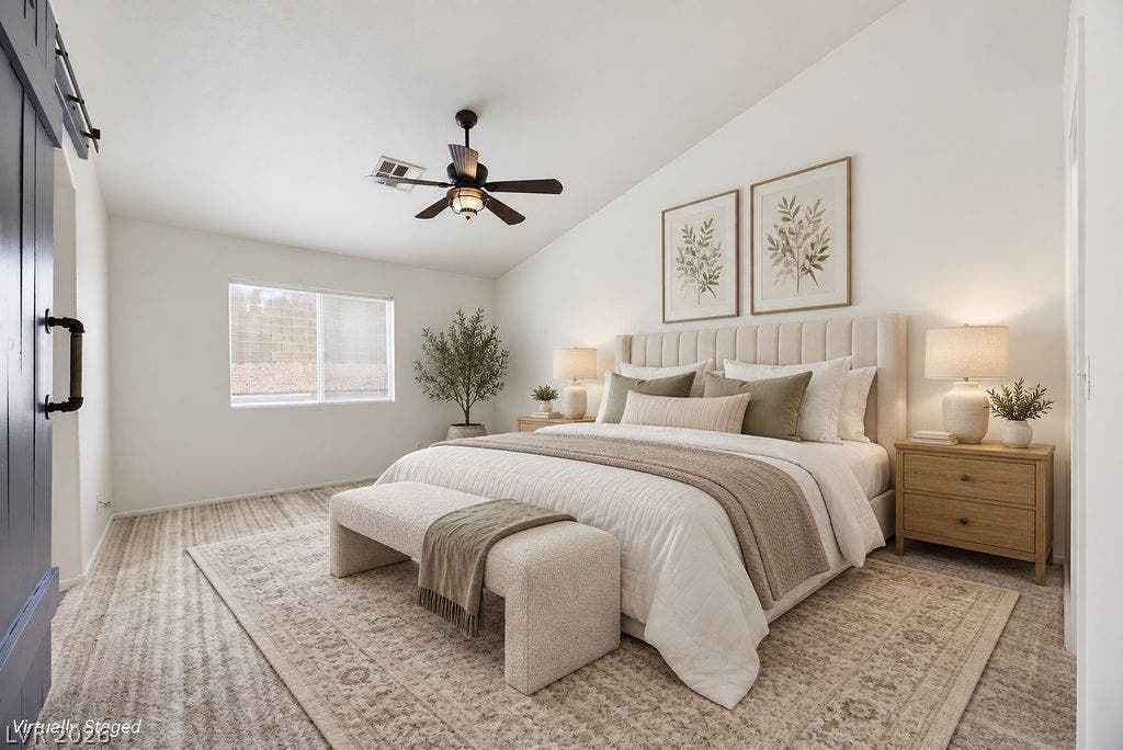409 Groft Way, Henderson, NV 89015 VIRTUALLY STAGED - An angled ceiling and textured carpeting elevate this serene, light-filled sleeping space.