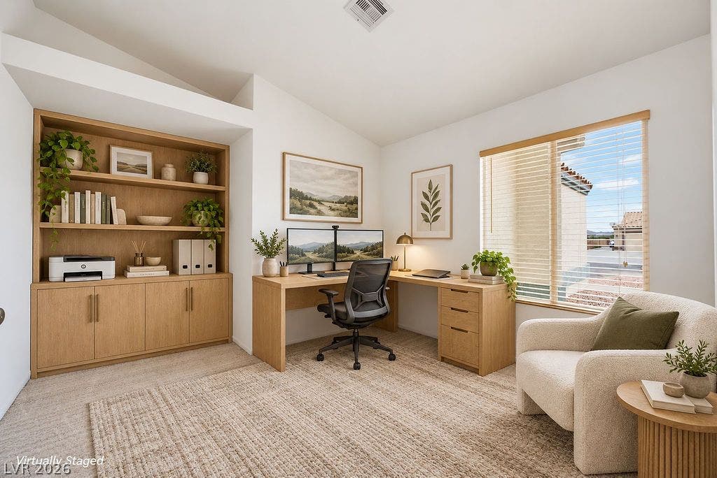 409 Groft Way, Henderson, NV 89015 Bedroom #3: VIRTUALLY STAGED AS AN OFFICE - High vaulted ceilings and built-in oak shelving define this quiet, light-filled workspace.