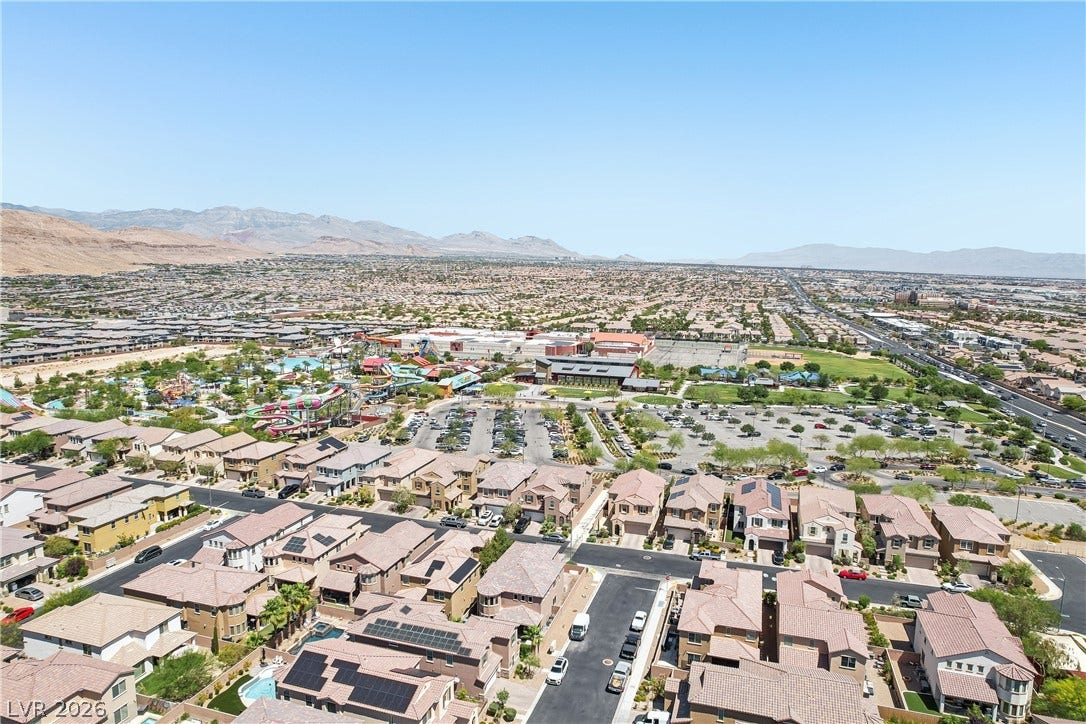 9490 Wild Valley Avenue, Las Vegas, NV 89148 Panoramic mountain and neighborhood views extend across this expansive valley setting.