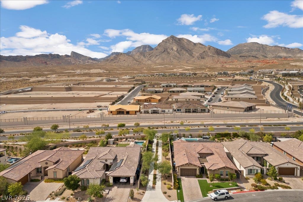 286 Besame Court, Las Vegas, NV 89138 Dramatic mountain backdrops frame this peaceful desert neighborhood of tile-roofed residences.