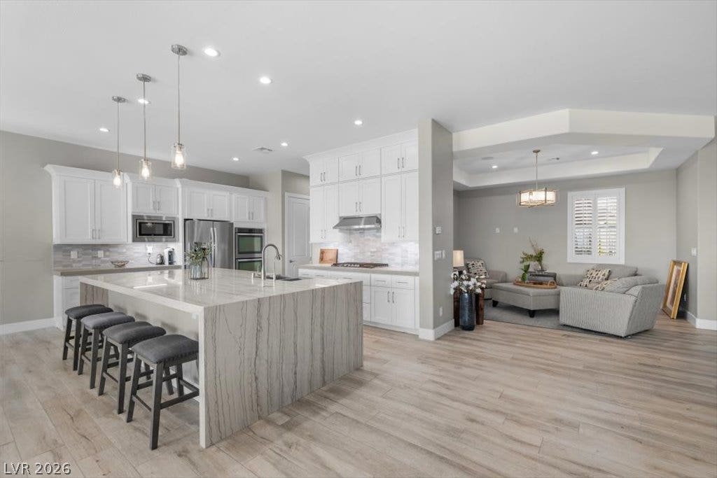 286 Besame Court, Las Vegas, NV 89138 An open floorplan seamlessly connects the culinary space with the adjoining living area.