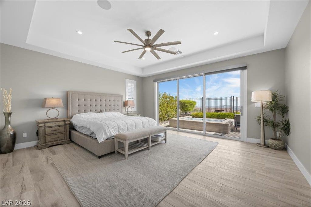 286 Besame Court, Las Vegas, NV 89138 Sliding glass doors open directly to the outdoor spa from this serene bedroom retreat.